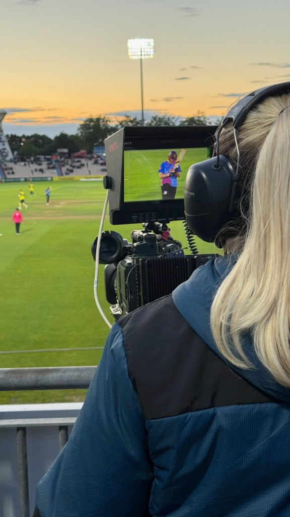 Ellie Lapping camera operating at a cricket match
